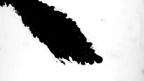 Spraying black paint on a white background Stock Footage 305493081