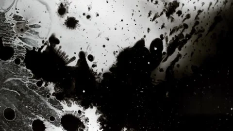 Spraying black paint on a white background Stock Footage 305493086