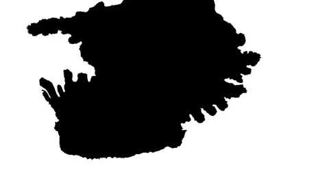 Spraying black paint on a white background Stock Footage 305493145