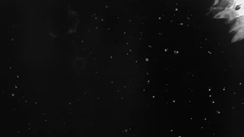 Spraying black paint on a white background Stock Footage 305493159