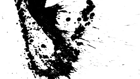 Spraying black paint on a white background Stock Footage 305493178