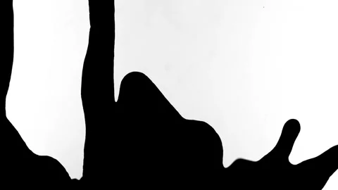Spraying black paint on a white background 動画素材 305493179