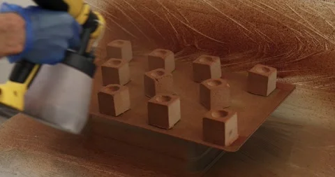 Spraying chocolate dessert cubes Stock Footage 289411116