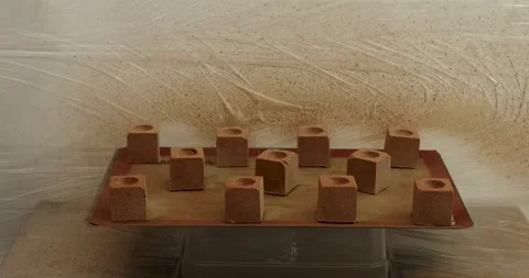 Spraying Chocolate mousse cubes Stock Footage 289411030