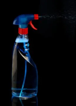 Spraying Cleaning Fluid Stock Photos