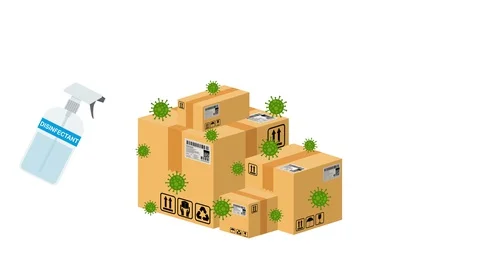 Spraying disinfectant on parcels and boxes during coronavirus 库存影片 129495243