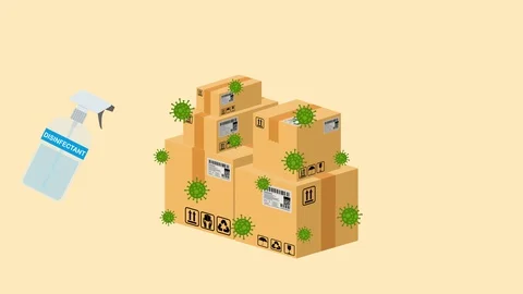 Spraying disinfectant on parcels and boxes during coronavirus Stockbeeldmateriaal 129497617