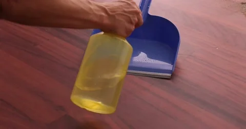 Spraying the dustpan 2 Stock Footage 132220458