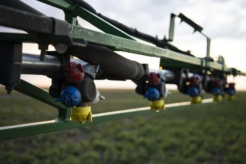 Spraying farm on a tractor close-up. Stock Photos