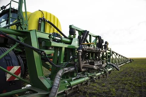 Spraying farm on a tractor close-up. Stock Photos