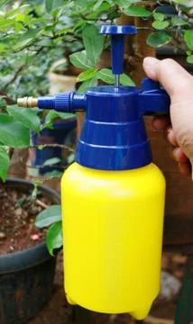 Spraying fertilizer Stock Photos