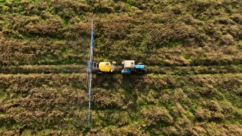 Spraying field at farm. Tractor use spray and irrigation method. Stock Footage 204016637