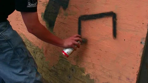 Spraying graffiti Stock Footage 39814869
