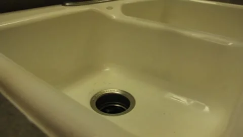 Spraying The Kitchen Sink Stock Footage 7340632