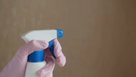 Spraying liquid from a plastic bottle. Close up Stock Footage 126626838