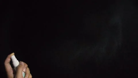 Spraying Mist with Black Background Stock Footage 153213757