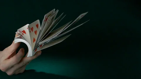 Spraying  playing cards, Slow Motion Stock Footage 25364749