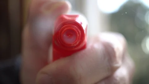 Spraying some Detergent on the Window, Slow Motion Stock Footage 122108715