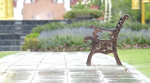 Spraying water on the bench in the park Stock Footage 51604784