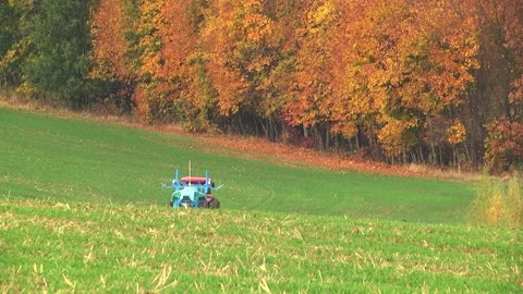 Spraying a wheat field. Application of plant protection products Stock Footage 145935430