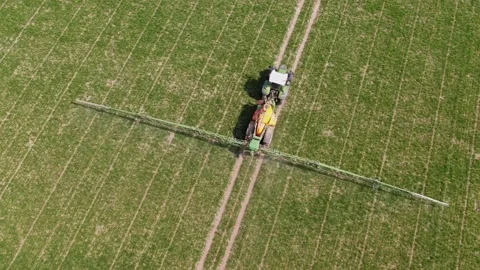 Spraying Wheat UK Stock Footage 152760131