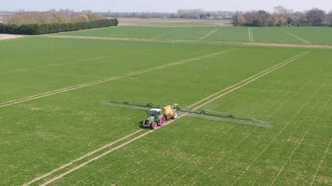 Spraying Wheat UK Stock Footage 152760144