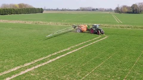 Spraying Wheat UK Stock Footage 152760324