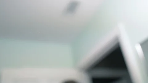 Spraying Window Cleaner on a Mirror and Wiping it Down Stock Footage 126552185