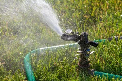 Spraying the yard Stock Photos