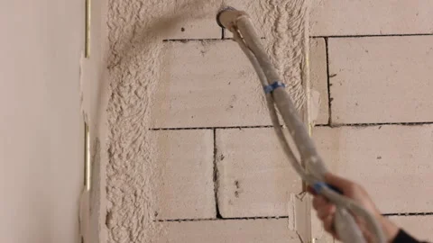 Sprays putty, Concrete block, Interior renovation Stock Footage 341430842