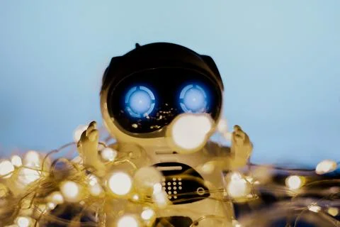 Spread and Development Artificial Intelligence in New Year. Small real robo.. Stock Photos