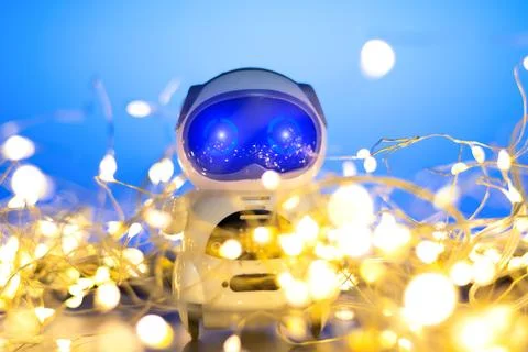 Spread and Development Artificial Intelligence in New Year. Small real robo.. Stock Photos