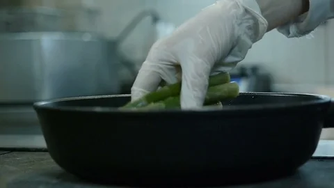 Spread Asparagus in Frying Pan Stock Footage 78595477