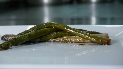Spread Asparagus On Plate Stock Footage 78595616