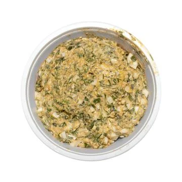 Spread on bread with herbs and egg.Homemade spread on bread. Stock Photos