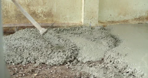 Spread the cement with a hoe.Pouring cement for smooth areas. Stock Footage 281237622