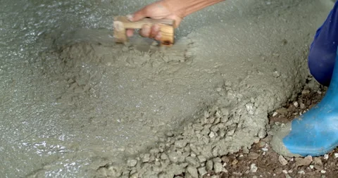Spread the cement with Plastering trovel.Hand Holding Trowel and Smoothing. Stock Footage 281237497