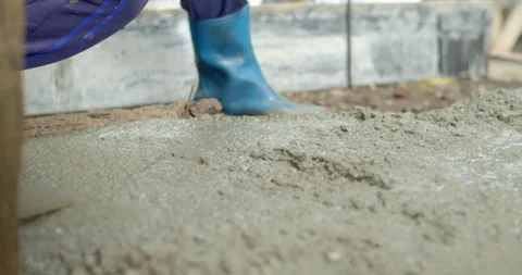 Spread the cement with Plastering trovel.Hand Holding Trowel and Smoothing. Stock Footage 289558050