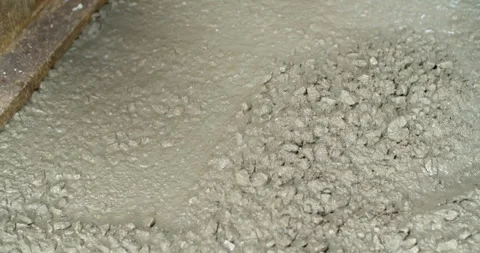 Spread the cement with Plastering trovel.Hand Holding Trowel and Smoothing. Stock Footage 289558533