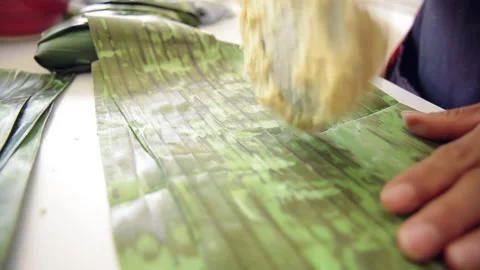 Spread corn dough masa for authentic mexican tamales 45 Stock Footage 135845171