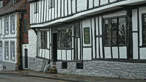 Spread Eagle Hotel, Midhurst, UK, 15th century. Historic timber framed building Stock Footage 230698072