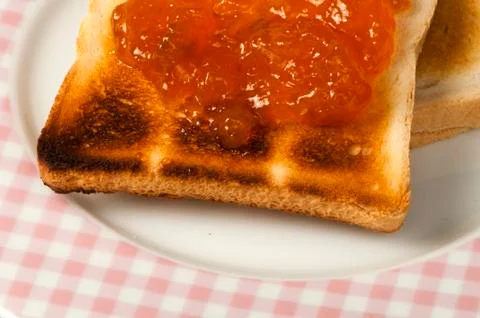 Spread jam on bread Foto stock