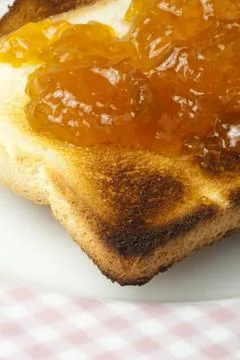 Spread jam on bread Spread jam on bread ,model released, Symbolfoto Copyri... Stock Photos