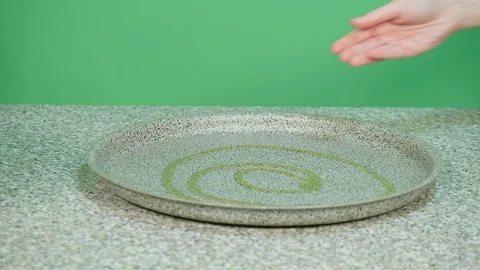 Spread olive oil with your hands in the pan to prepare supreme Italian pizza Stock Footage 126789192