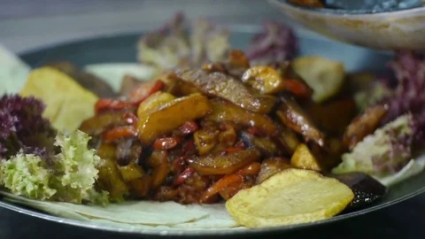 Spread Out Vegetables With Meat on Saj Red Pepper on Top Stock Footage 78594857