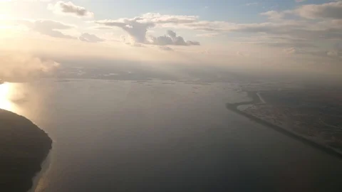 Spread over a wide river. The sun sets down. Stock Footage 107829525