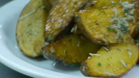 Spread Potatoes on Plates Stock Footage 78593645