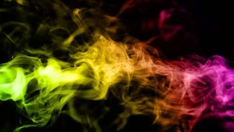 Spread real colored smoke or steam on a black isolated screen background Stock Footage 105344979
