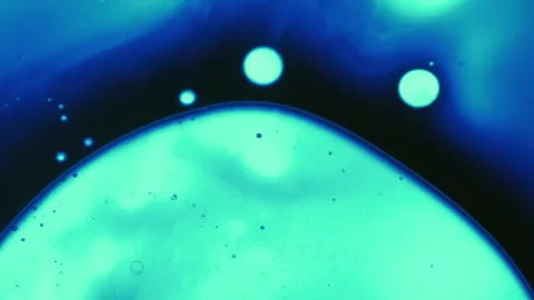 Spreading blob paint spot neon water liquid light Video stock 320462049