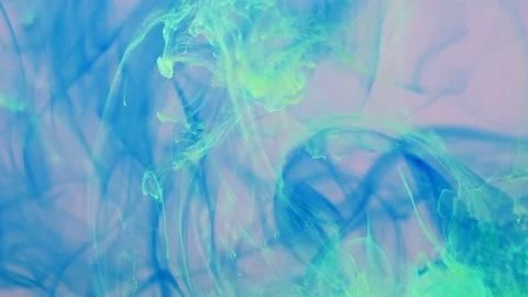 Spreading of blue, green paint in a liquid pink space. Stock Footage 168828656